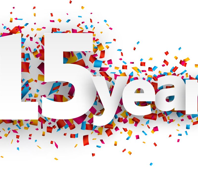 Fifteen years paper confetti sign.